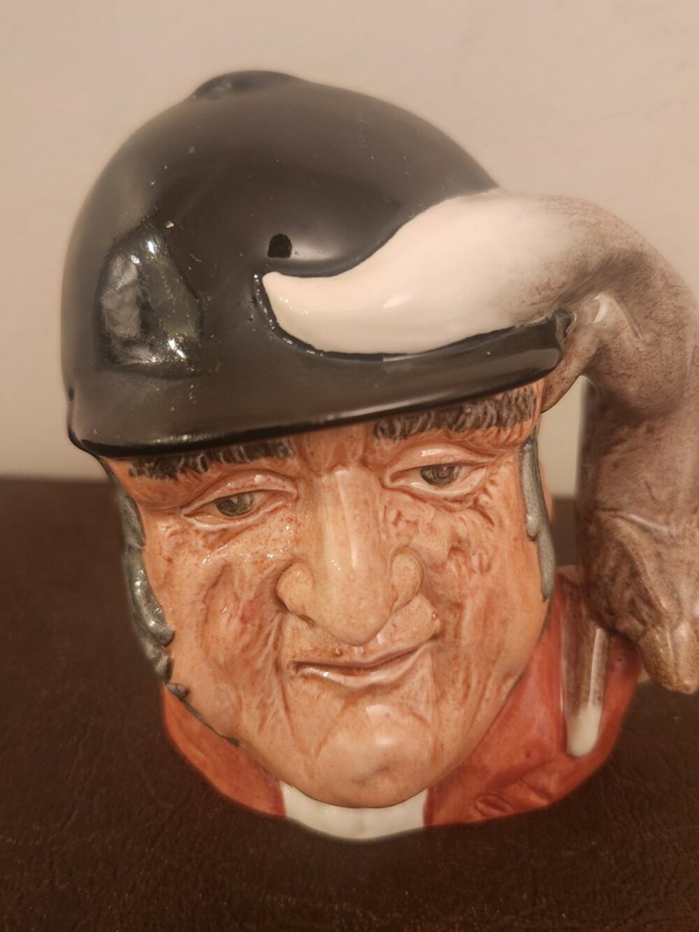 Vintage Royal Daulton "Gone Away" Character Jug (D6538) is a large, multicolor